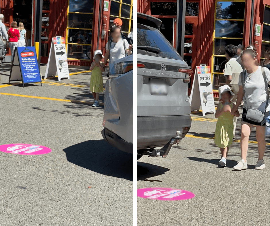 'Walk your wheels' sticker on a road on Granville Island